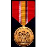 Medal - U.S. Military Issue  National Defence Service Medal with ribbon, still in its original bag.