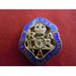 A Royal Australian Artillery Sweetheart badge in brass with blue enamel, KC. Scarce