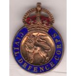 British Lapel Badge:- Civil Defence Corps, KC, gilt + blue and red enamel.  Lion in a circled