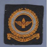 RAF blazer badge - Air Gunners Association.  Central device - a winged bullet marked 'AGA'