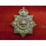 The Royal Sussex Regiment Blue Cloth Helmet Plate, Kings Crown.