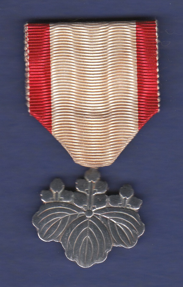 Japanese Order of the Rising Sun 8th Class, in silver. GVF