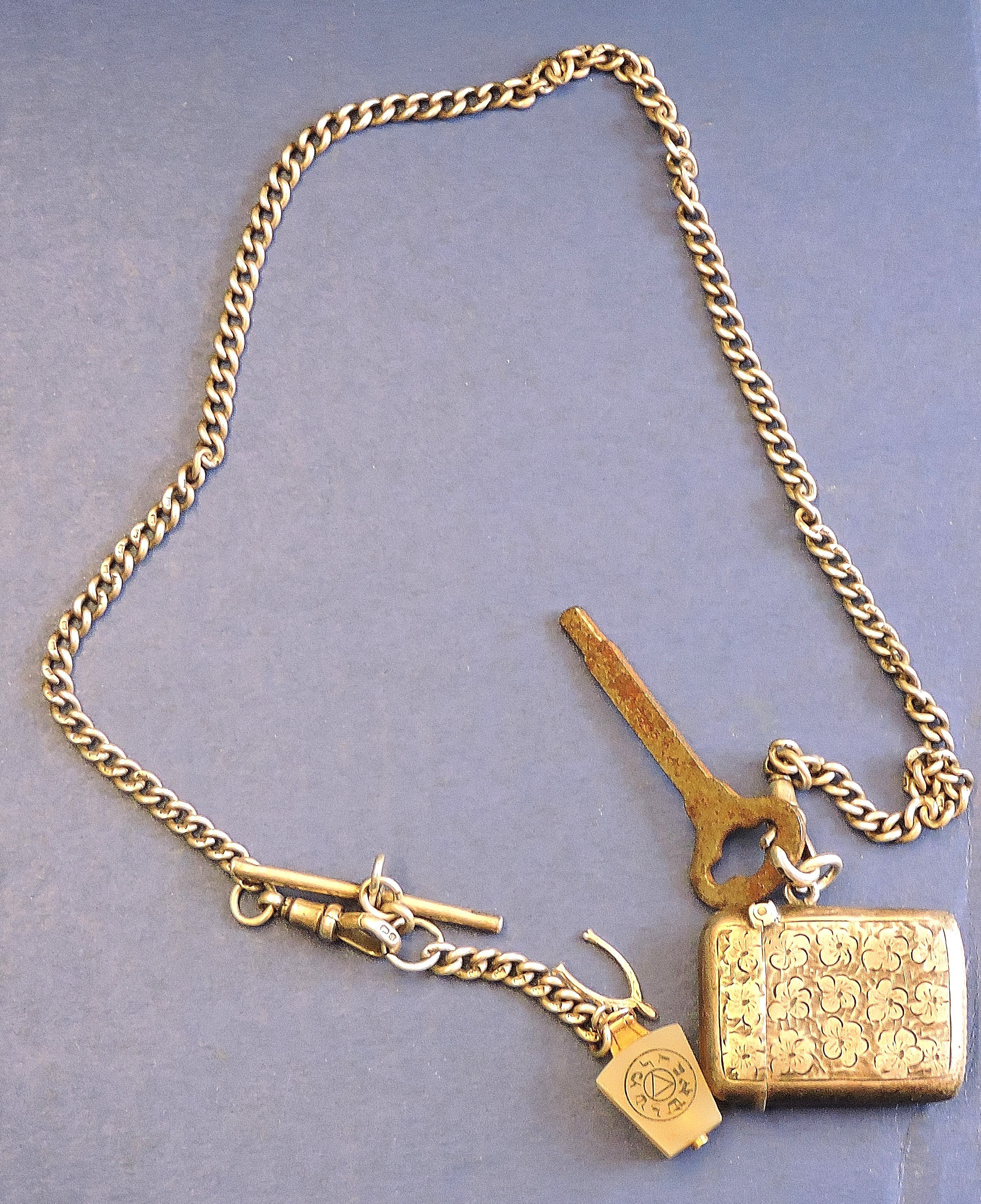 Silver Vesta Case  Hallmarked Chester 1904 and a Silver Watch Chain, approx 50 grams.