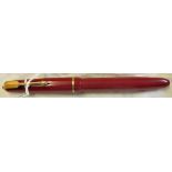 1950's Parker Duofold in DK. Red 14K gold nib (Slight damage to comb) Fair condition, no cap top.