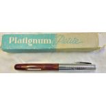 Platignum Petite with chromed cap and marble effect body. Excellent condition in original box of