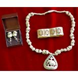 Necklace, Wrist Band & Earrings  Beautifully carved ivory necklace, wrist band and earrings with