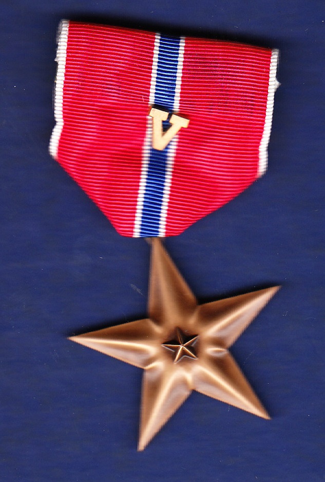 Use Bronze Star Medal with (V) Clasp which was awarded for valour in the field. Excellent example.