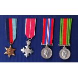 WWII Miniature medals including a miniature OBE, The 1939 - 1945 Star, The Defence medal and the