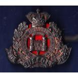 Victorian The Suffolk Regiment cap badge, solid silver with QVC. A scarce cap badge.