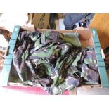 A box of Army Cadet Uniforms including: many pairs of trousers, combat dress jackets, service