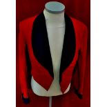 Red Mess jacket.  Navy shawl collar and cuffs.  No buttons.  Name: F.W.Ball Esq. 1924.