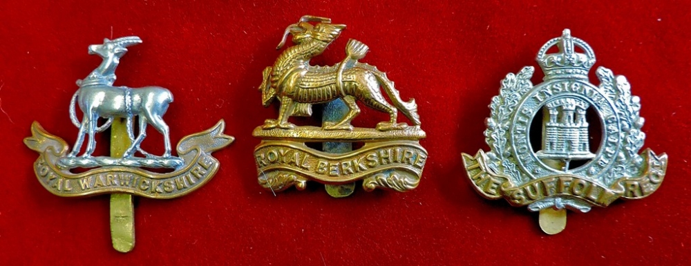 WWI Cap badges (3) Royal Warwickshire, Suffolk Regiment and Royal Berkshire Regt. Nice group.