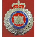 Edmonton Police Service cap badge, white metal with enamel facings. Good condition with screw back