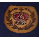 W.O.II Arm Badge, dress uniform. QEII Crown in full colour in wreath of gold wire, embroidered on