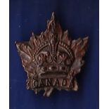 WWI Canadian Expeditionary Force cap badge, made from darkened brass with bronze finish.