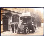 RP Post Office  with 3 staff standing outside with Royal Mail vehicle.  Slight crease at top right