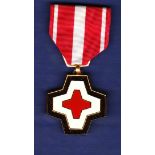 Vietnam Life Saving medal showing red cross, an interesting medal with a gilt design. Good