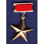 Vietnamese The Gold Star Order  - A simple medal design based upon the Russian medal, established on