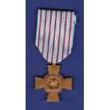 WWII French Combatant's Cross ("Croix du combattant") is a French decoration that recognizes, as its