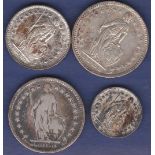 Switzerland - Various Francs (4) 1886 Two Francs, Grade good fine; 1957 Two Francs, Grade EF; 1960 1