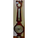 A good quality, 19th C, flame mahogany banjo barometer with swan neck pediment and brass finial.