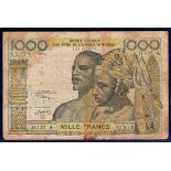 Banknotes - Ivory Coast 1000 Francs  Ref P103A, Sig 10, Grade Fine.