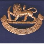 Rhodesia General Service cap badge, WWII and well worn (brass)