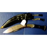 Ceremonial Kukri Knives  In black leather sheath with metal tip and belt loop.