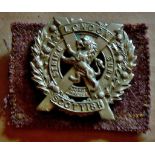 WWII London Scottish Regiment (White metal with a khaki cloth backing)