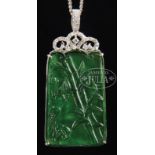 CARVED JADEITE RECTANGULAR PENDANT WITH DIAMONDS. Of rectangular form with rounded top, the