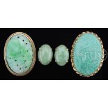 GROUP OF JADEITE JEWELRY. China. Including two brooches and a pair of earrings all mounted in