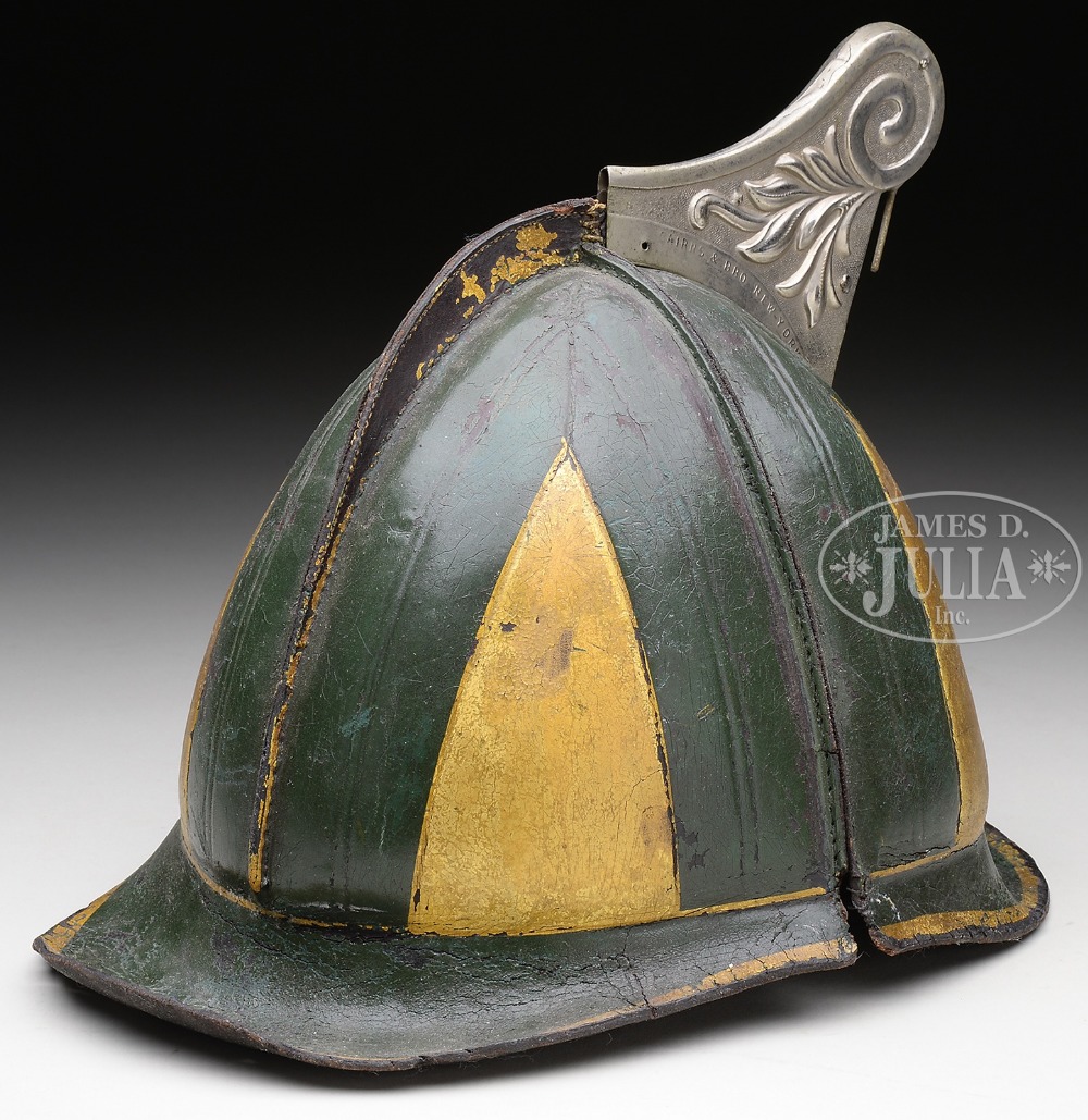 CHILD'S PAINTED LEATHER AND METAL FIRE HELMET. A small size antique 19th century helmet in green and - Image 2 of 2