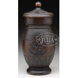 RARE CARVED PINE TOBACCO JAR WITH LID. 2nd Quarter 19th Century American. The lathe turned urn