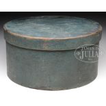 BLUE PAINTED PANTRY BOX. Circa 1830 New England. The ash and pine round box with conforming lid of