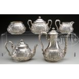 FIVE PIECE STERLING TEA SET BY DOMINICK & HAFF. The set consisting of 8" tea pot, 5" tea pot, 4-1/2"