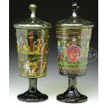 PAIR OF ENAMEL DECORATED POKALS. First third 20th Century Germany. Olive green dimpled glass
