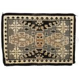 NAVAJO TWO-GRAY HILL RUG. Elaborate pattern with step serrated chevrons outlined with triangular