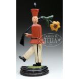 RARE SOLDIER WITH FLOWER IN GUN DOORSTOP. Circa 1920, American. Unknown foundry. Solid flattened