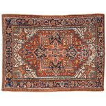 HERIZ ORIENTAL RUG. 2nd quarter 20th century. This small example with polychrome central lobated