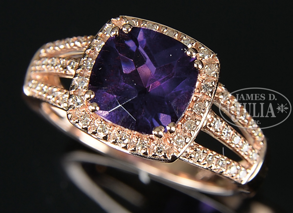 14KT ROSE GOLD DIAMOND AND AMETHYST LADY'S RING. The center square cut amethyst in deep color