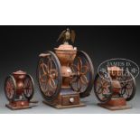 THREE PAINT DECORATED TABLETOP COFFEE GRINDERS. 1) 27" h. x 17" (wheel). Enterprise coffee grinder