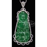 FINE NATURAL JADEITE DIAMOND AND GOLD PENDANT. The Jadeite Guanyin coming with a Hong Kong Gems