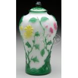 SIX COLOR WHITE PEKING GLASS LIDDED VASE. 19th Century. having well carved green plants growing from