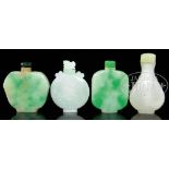FOUR JADEITE SNUFF BOTTLES. China. Three flask form, one pear shaped. SIZE: 2-1/4”h tallest.