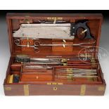 CASED ENGLISH FIELD SURGICAL AND AMPUTATION SET. The fitted mahogany case having a fitted area in