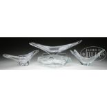 FOUR DAUM NANCY CLEAR GLASS CENTERPIECES. Three signed "Daum France", the other signed "Daum". SIZE: