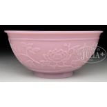 PINK PEKING GLASS BOWL. 18th century, China. Cameo carved with reserves of cats, birds, butterflies,