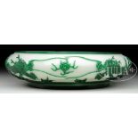 GREEN TO PALE YELLOW CAMEO CUT PEKING GLASS BOWL. 19th century, China. Design of dragons,