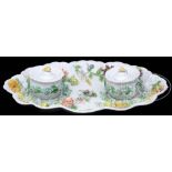 DECORATED PORCELAIN DOUBLE INKSTAND. The inkstand having 2 removable covered ink wells which set