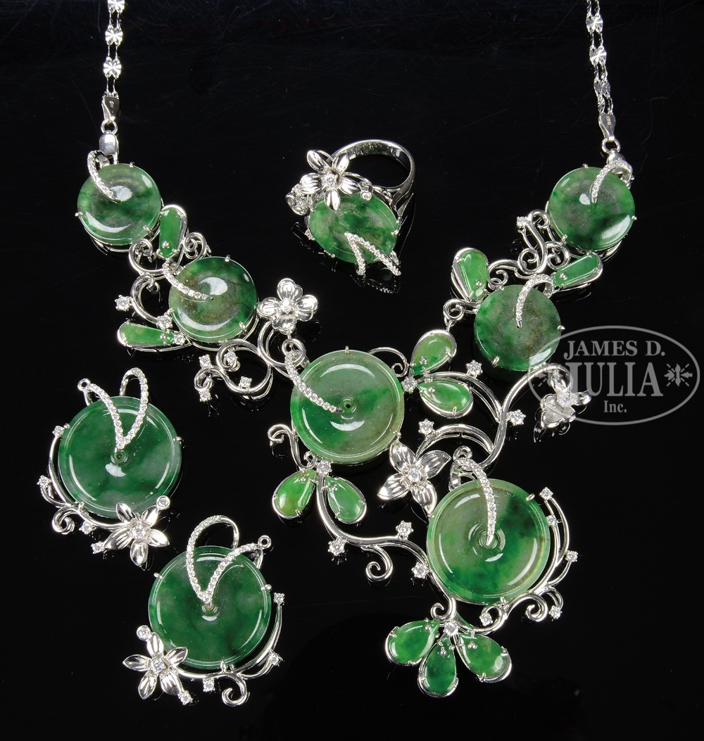 SUITE OF JADEITE JEWELRY WITH DIAMONDS. The well-designed jewelry set includes a large necklace, two